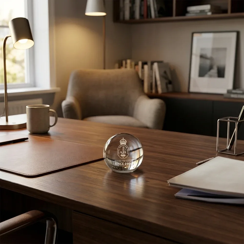 Royal Australian Navy 125th Anniversary Desk Paper Weight on a Desk